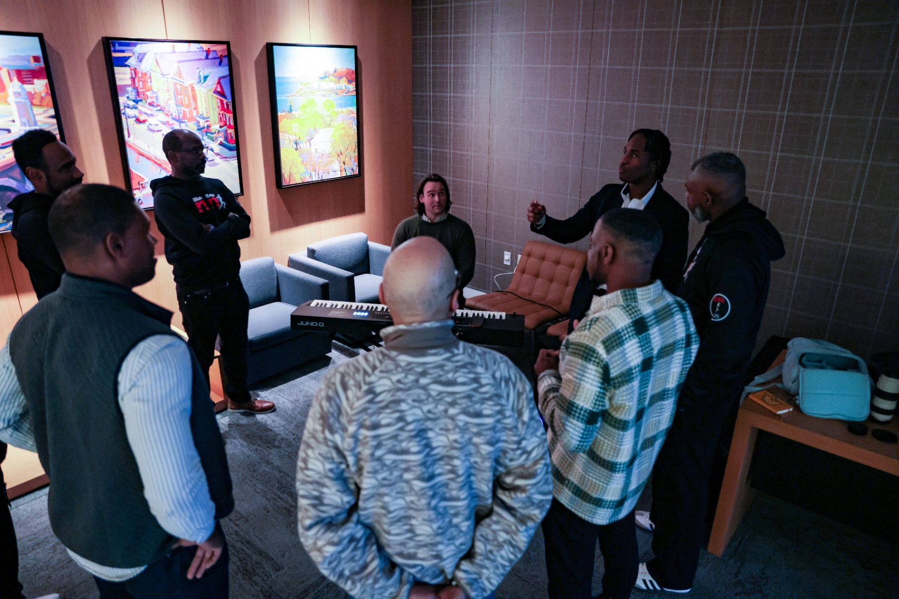 A workplace team laughing during an MF Improv team building exercise